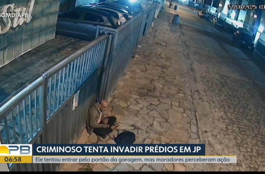  Câmeras de segurança registram homem tentando invadir dois prédios, em João Pessoa